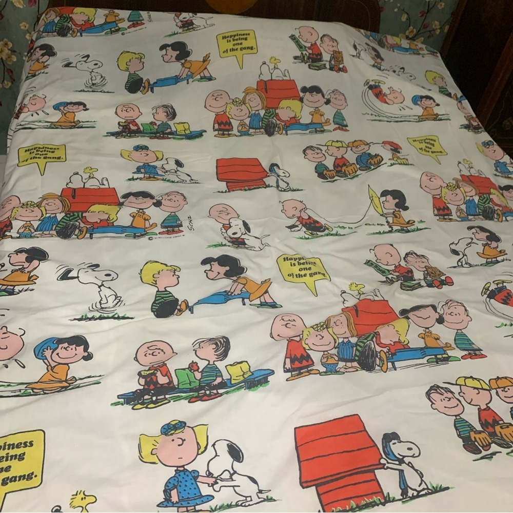 1971 snoopy and gang flat sheet twin but will cover the top of a queen bed